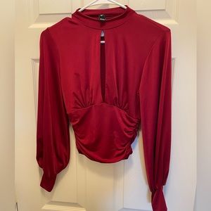 Burgundy top. Brand new. Size small